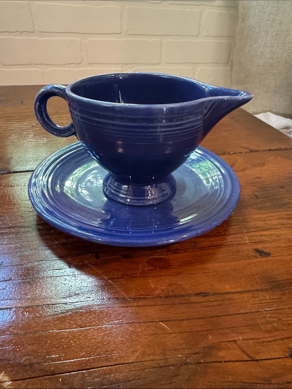 Fiestaware Creamer and Plate Set